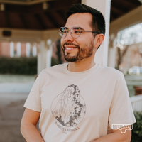 Angel's Landing tee in soft cream set against a St. George, UT backdrop